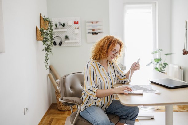 young-woman-checking-her-bills